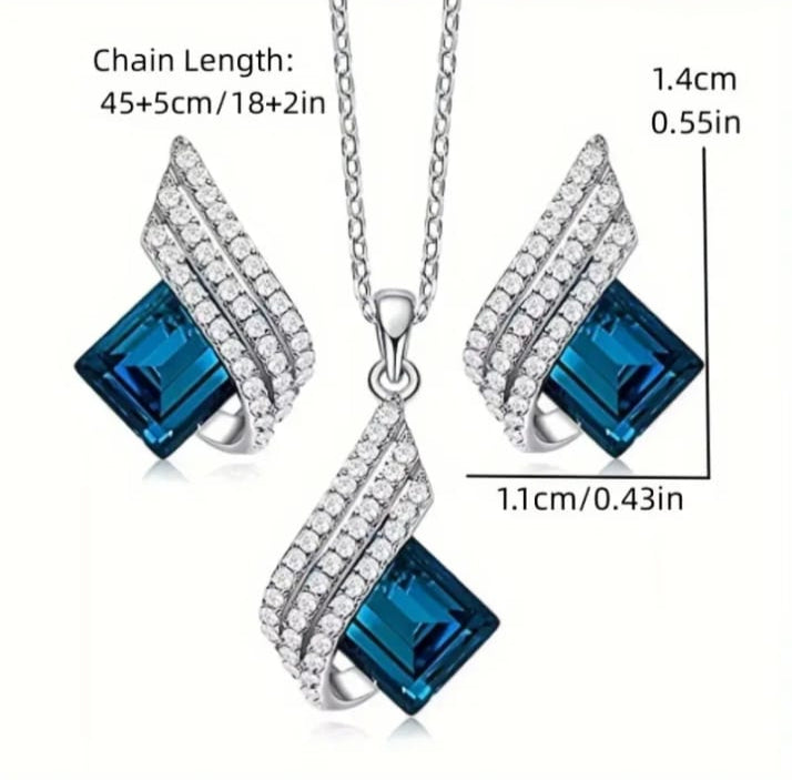 Elegant Blue Crystal Angel Wings Pendant Necklace Set with Sparkling Accents.