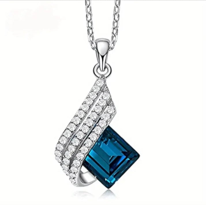 Elegant Blue Crystal Angel Wings Pendant Necklace Set with Sparkling Accents.
