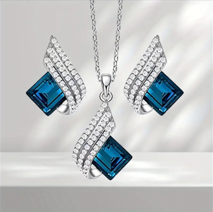 Elegant Blue Crystal Angel Wings Pendant Necklace Set with Sparkling Accents.