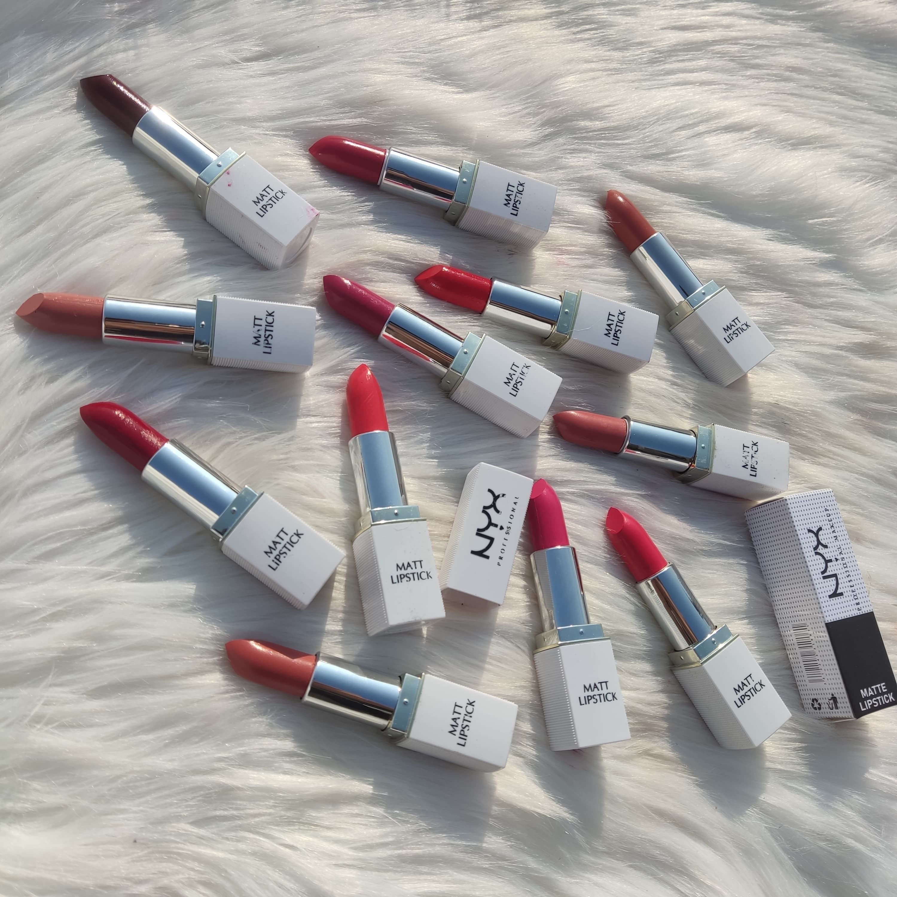 NYX COSMETIC  PROFESSIONAL MAKEUP.. MATTE FINISH WHITE CASING LIPSTICK SET WITH ONE PIECE PACKAGING.. 12 DIFFERENT SHADES AVAILABLE  PACK OF 12 PIECE BOX