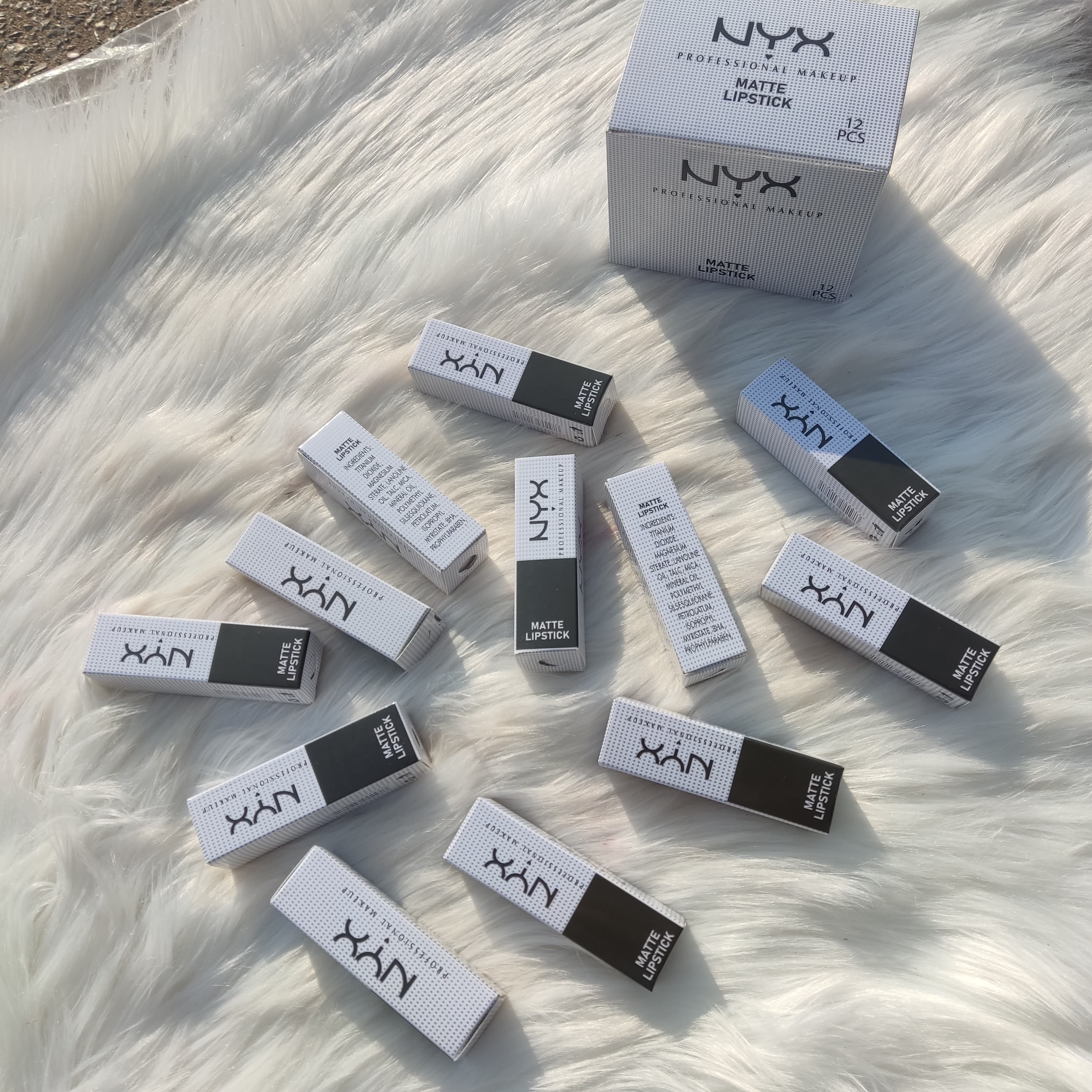 NYX COSMETIC  PROFESSIONAL MAKEUP.. MATTE FINISH WHITE CASING LIPSTICK SET WITH ONE PIECE PACKAGING.. 12 DIFFERENT SHADES AVAILABLE  PACK OF 12 PIECE BOX