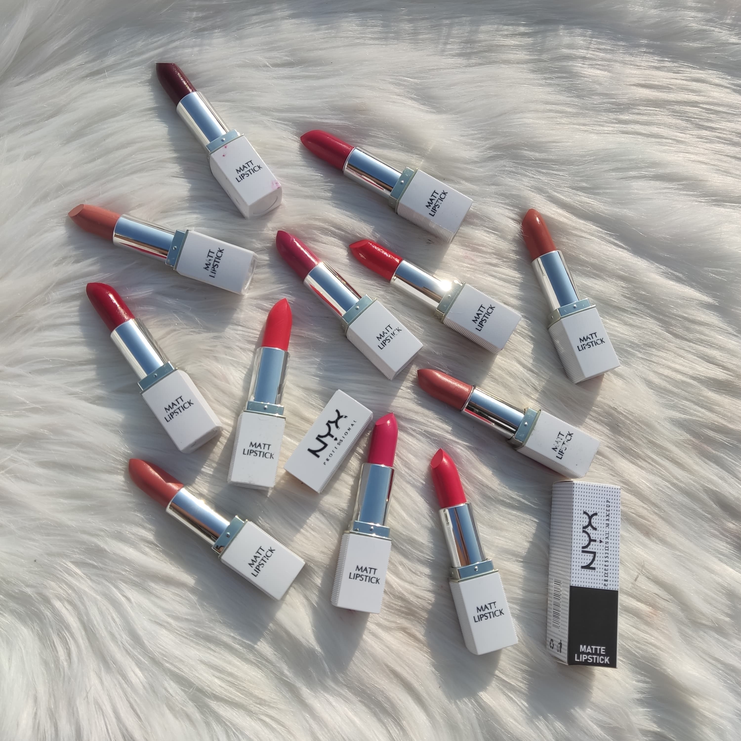 NYX COSMETIC  PROFESSIONAL MAKEUP.. MATTE FINISH WHITE CASING LIPSTICK SET WITH ONE PIECE PACKAGING.. 12 DIFFERENT SHADES AVAILABLE  PACK OF 12 PIECE BOX